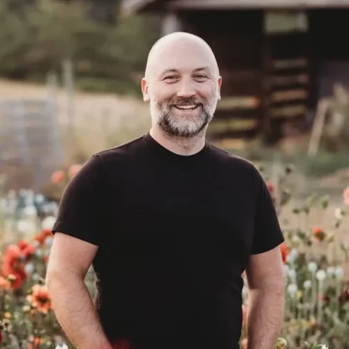 Shaun Spence in his art inspiring garden